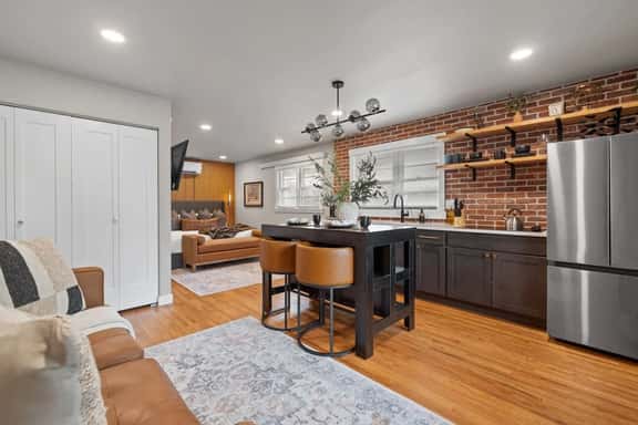 Stylish Studio · King Bed, Brick & Trex Deck - Image 1