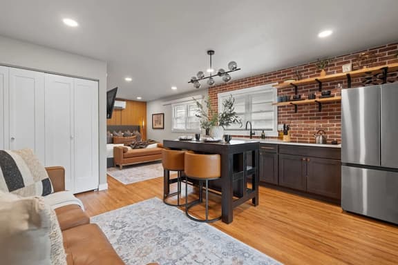 Stylish Studio · King Bed, Brick & Trex Deck - Image 1